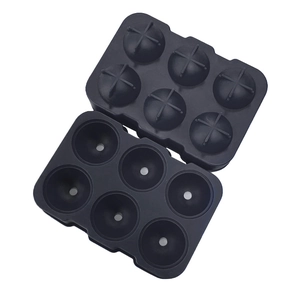 Black 6-cavity silicone ice ball mold with lid for round ice spheres on white background