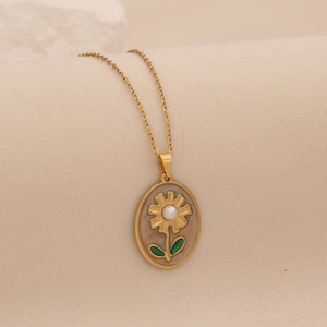 Vintage golden sunflower necklace with oval floral pendant and white pearl center