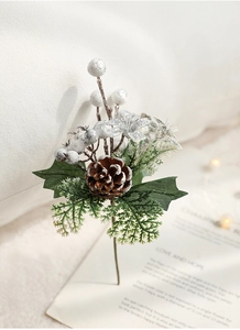 Christmas pine cone sprig with white frosted berries and needles for holiday decor