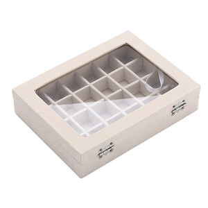 Beige 24-slot jewelry storage box with a transparent lid and metal buckles