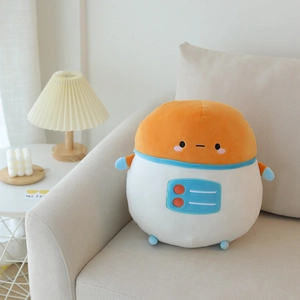 Detail of soft astronaut potato plush pillow with smooth fabric on a cozy home sofa