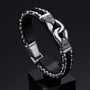 Men's multilayered black woven rope bracelet with 316L stainless steel clasp