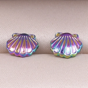 Macro shot of 304 stainless steel shell earrings with iridescent neon gradient finish