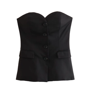 Detail of black strapless tube top with lapel collar effect and single-breasted buttons