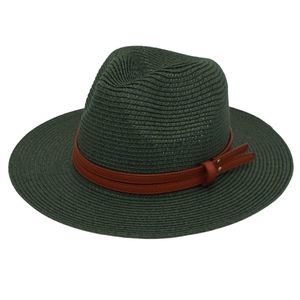 Detail of dark green straw fedora hat with brown leather band and metal buckle
