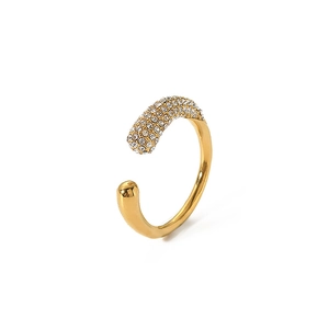 Macro shot of 18k gold plated stainless steel open ring with teardrop paved crystals