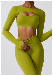 Detailed view of lime green three-piece yoga set with cutout top and leggings