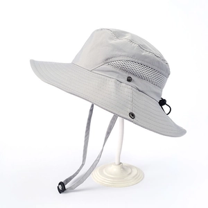 Detail view of light grey sun hat featuring breathable side mesh and adjustable chin strap