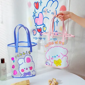 Transparent PVC tote bag with cute cartoon prints and colorful handles for beach or travel