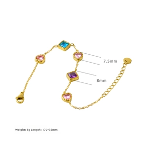 Detail view of 18K gold plated heart bracelet with colorful cubic zirconia stones