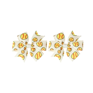 Pair of white grosgrain ribbon hair bows with red and yellow baseball print patterns