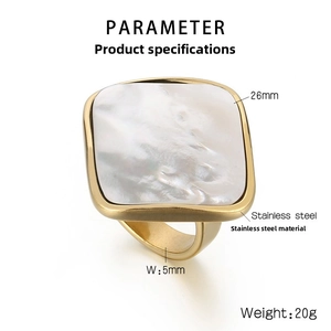 Macro detail of square shell ring dimensions: 26mm face width and 5mm gold steel band