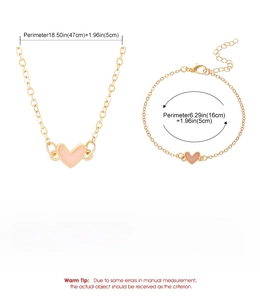 Detailed size and material specifications for gold heart necklace and bracelet jewelry set