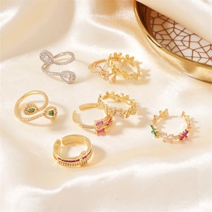 Elegant gold and silver butterfly ring set with colorful zircon on satin fabric