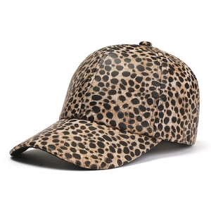 Women's leopard print PU leather baseball cap with curved brim on white background