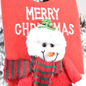 Christmas snowman hanging ornament with red knit scarf and Merry Christmas print
