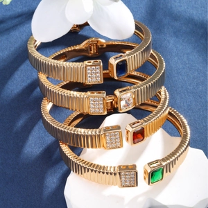 Luxurious gold-plated spring bangles set with colorful zircon stones in blue, red, green