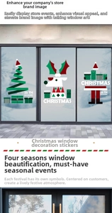 Close-up of geometric Christmas window decals with reindeer and tree for glass decoration
