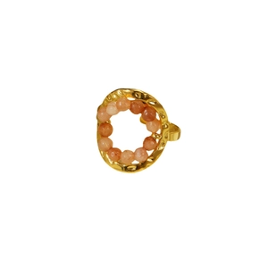 Adjustable golden titanium steel ring with orange beaded circle and hammered texture