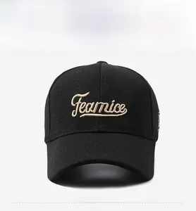 Detail of Fearnice gold cursive embroidery on a premium black structured baseball cap