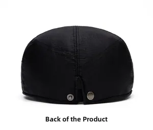 Rear view of black flat cap showing structured high-density fabric and silver metal snap button