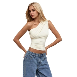 Slim fit cream one-shoulder ruched top paired with light blue denim jeans