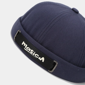 Bonnet docker bleu marine en coton avec ruban décoratif masicM sur le côté latéral