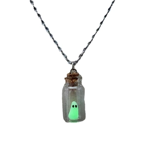 Luminous ghost necklace with glass drift bottle pendant and glowing green miniature