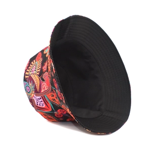 Detail of colorful paisley bucket hat with reinforced stitching on the brim and black lining