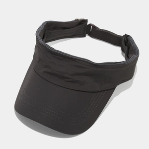 Detail of dark brown quick-dry sun hat with zipper edge and adjustable strap buckle