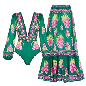Detail of green V-neck long-sleeve swimsuit and ruffled floral maxi skirt set