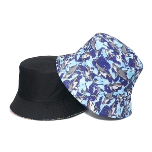 Classic black and shark print blue tie-dye bucket hats for sun protection and fashion