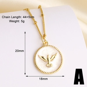 Macro shot of white enamel dove pendant with gold bead border and chain length details