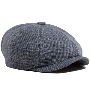Classic grey newsboy cap in textured wool blend fabric shown from a 45-degree angle view