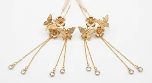 Silver butterfly and flower earrings with long chain tassels and sparkling crystals