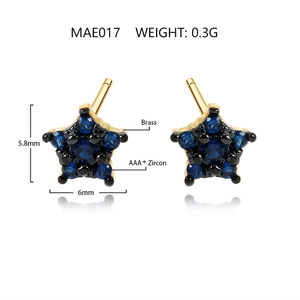 Macro detail of star stud earrings with blue zircon in gold brass frame, size 5.8x6mm