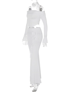 Detail of white two-piece set featuring a slim long sleeve top and ruffled maxi skirt
