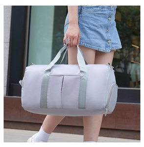 Short travel gym bag with wet dry separation and shoe compartment in urban setting
