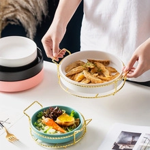 Elegant ceramic egg trays with gold metal stands in various colors for stylish home dining