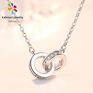 Close-up of an elegant S925 sterling silver necklace featuring interlocking pavé circles