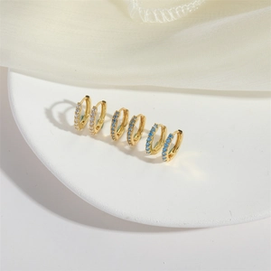 Chic gold hoop earrings set featuring micro-pave white and blue cubic zirconia stones