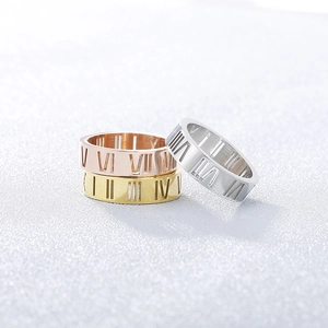 Classic Roman numeral hollow rings in gold, rose gold, and silver finishes for couples