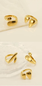 Detail of adjustable 18k gold plated stainless steel heart and geometric rings set