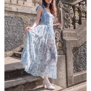 French retro light blue floral maxi dress with bow straps and layered flowing skirt