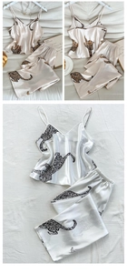 Detail of leopard print satin pajamas showing silky texture of camisole and pants set