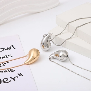 Minimalist hollow water drop pendant necklaces in gold and silver metallic finishes