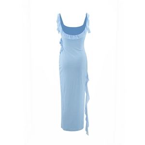 Detail view showing the backless design with ruffle trim on this light blue summer dress
