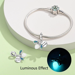 Luminous firefly charm in silver with blue glow and You Are My Light engraving