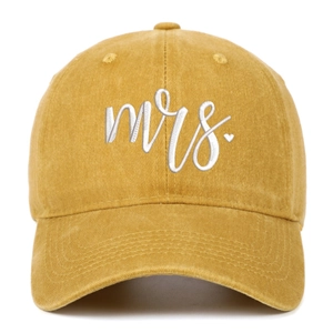 Detailed view of white Mrs. embroidery on vintage washed cotton yellow baseball cap