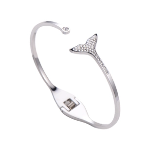Silver open spring bracelet featuring a sparkling rhinestone dolphin tail design